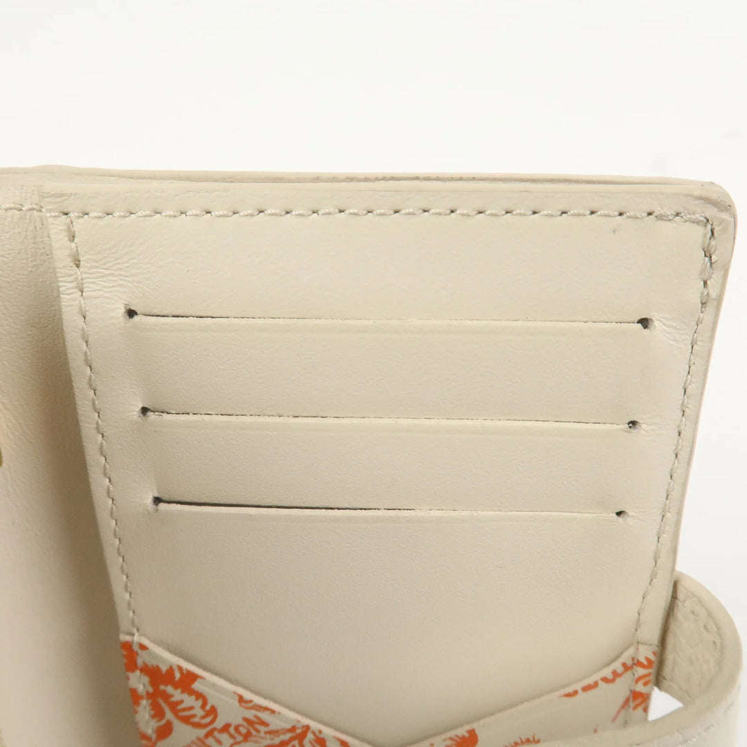 Louis Vuitton Capcines Taurillon Leather Vertical Wallet M11169