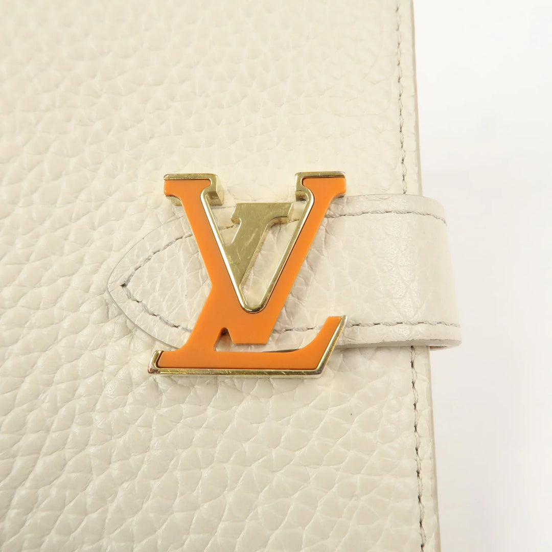 Louis Vuitton Capcines Taurillon Leather Vertical Wallet M11169