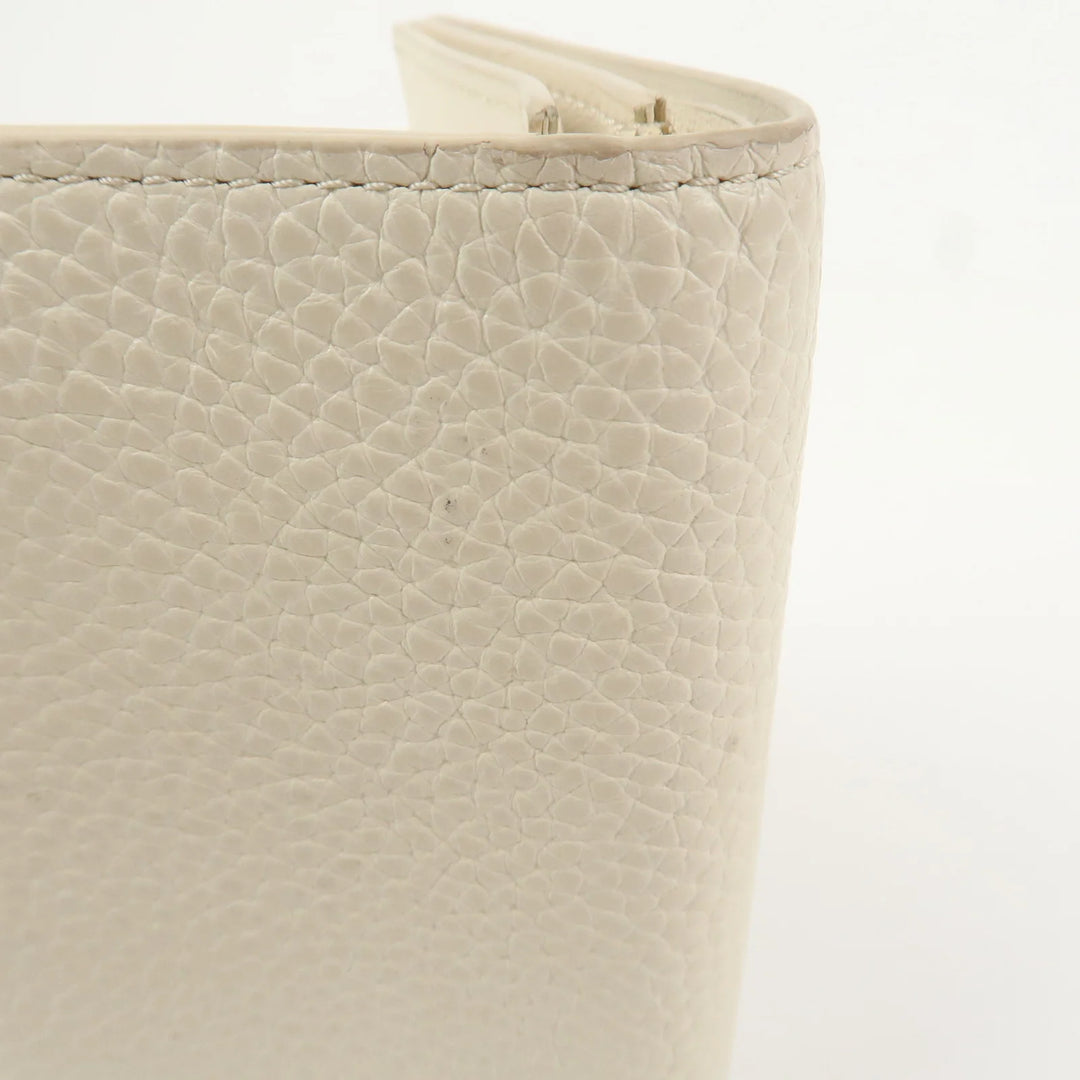 Louis Vuitton Capcines Taurillon Leather Vertical Wallet M11169