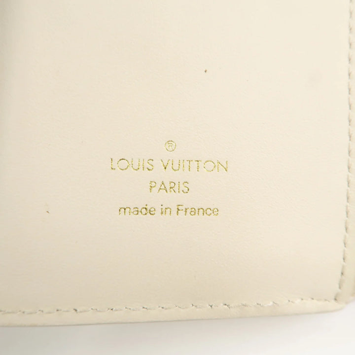 Louis Vuitton Capcines Taurillon Leather Vertical Wallet M11169