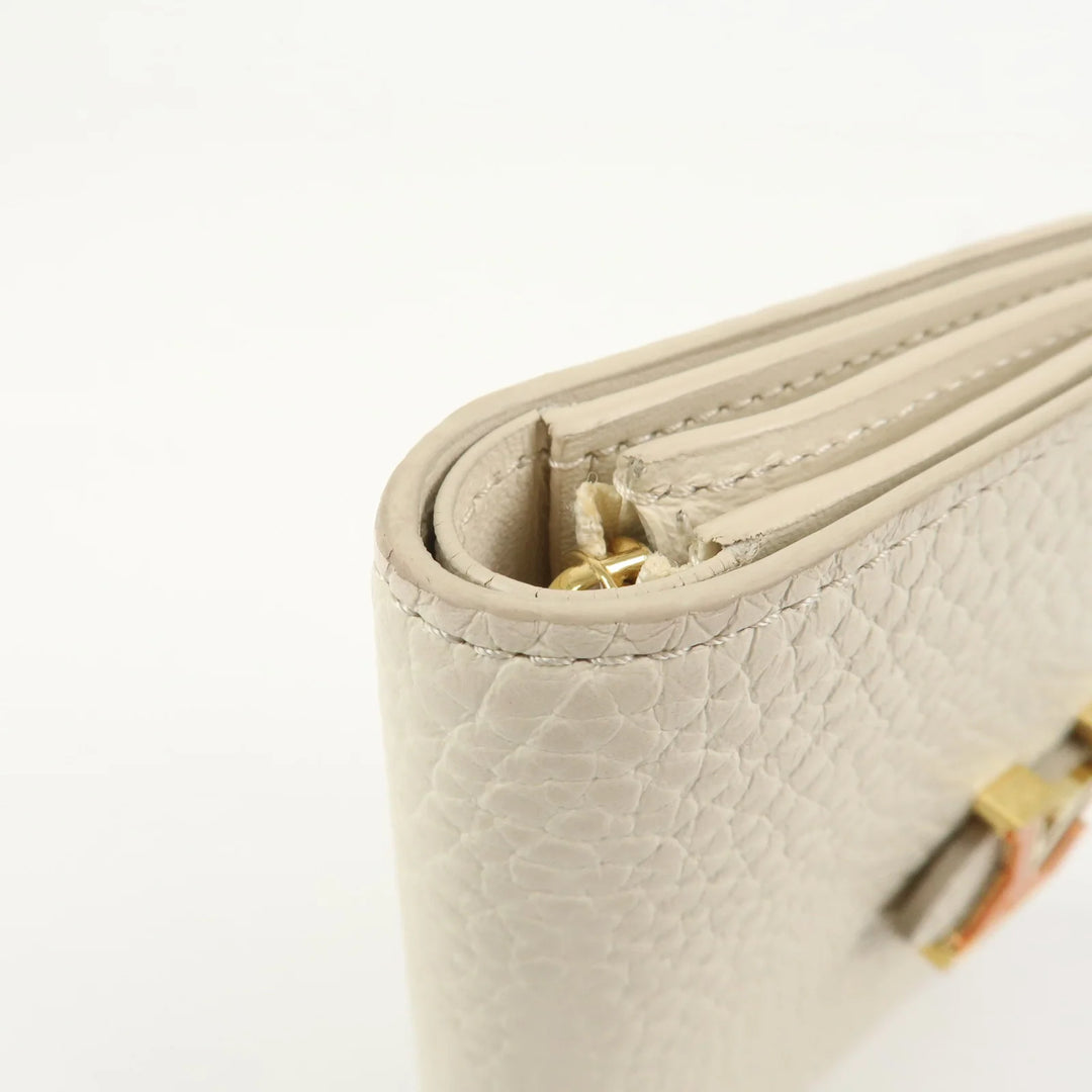 Louis Vuitton Capcines Taurillon Leather Vertical Wallet M11169