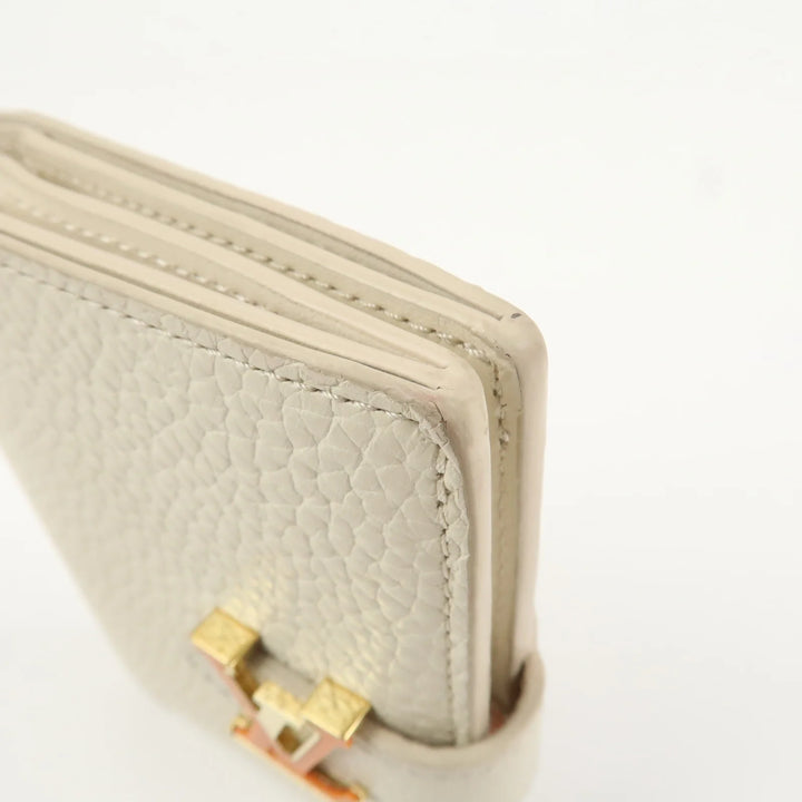 Louis Vuitton Capcines Taurillon Leather Vertical Wallet M11169