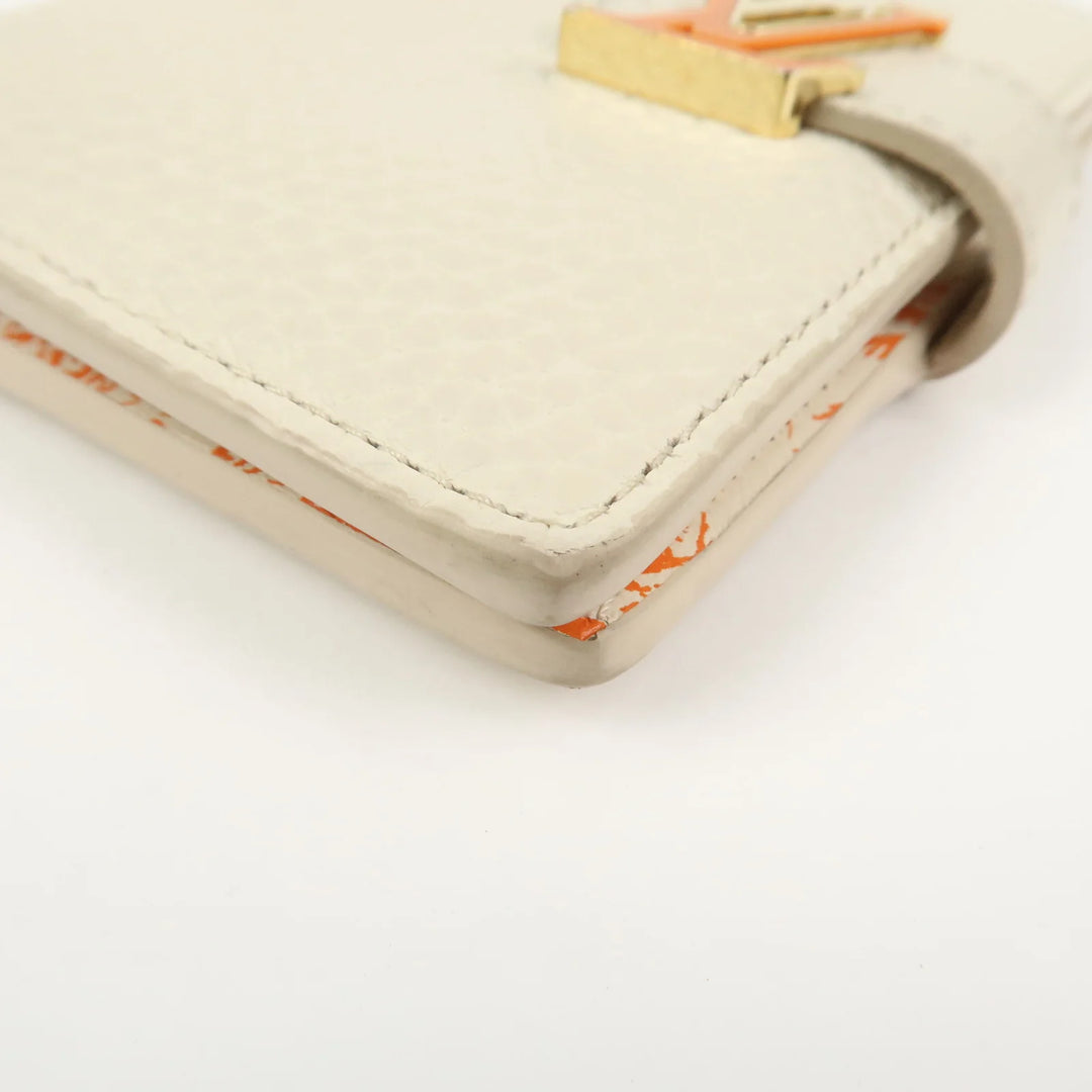 Louis Vuitton Capcines Taurillon Leather Vertical Wallet M11169