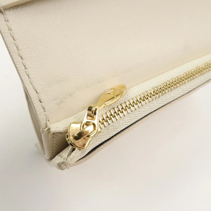 Louis Vuitton Capcines Taurillon Leather Vertical Wallet M11169