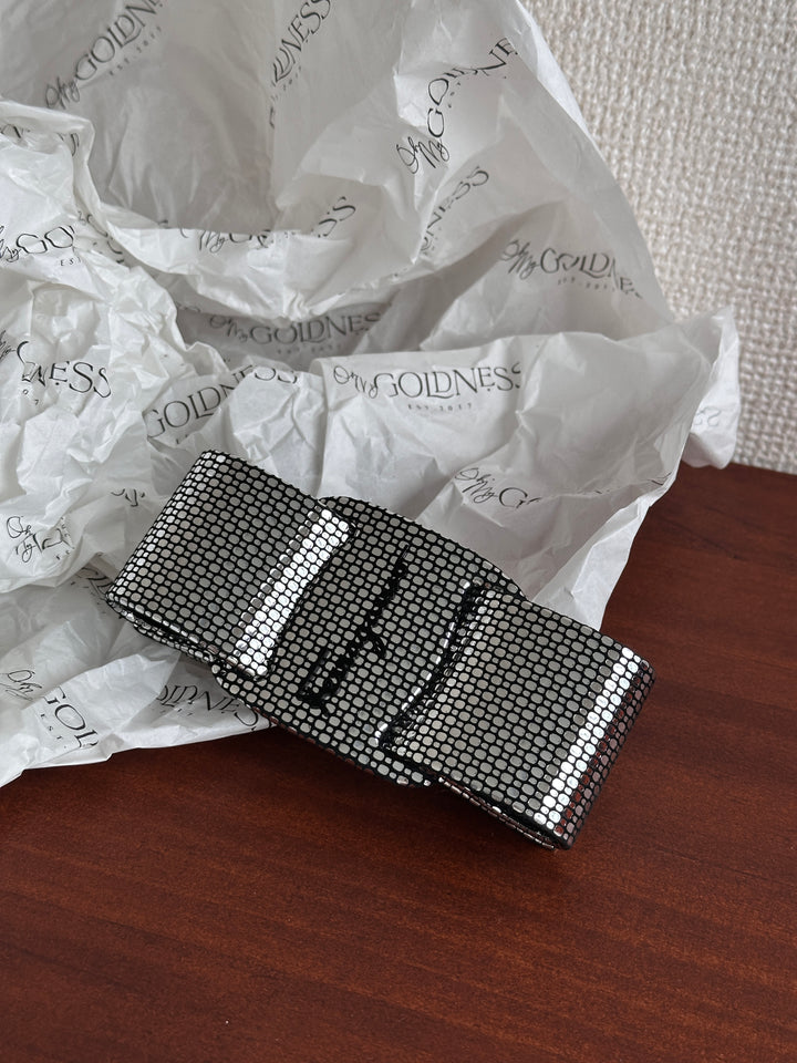FERRAGAMO Leather Bow Hair Clip – Shimmer Finish & Timeless Elegance