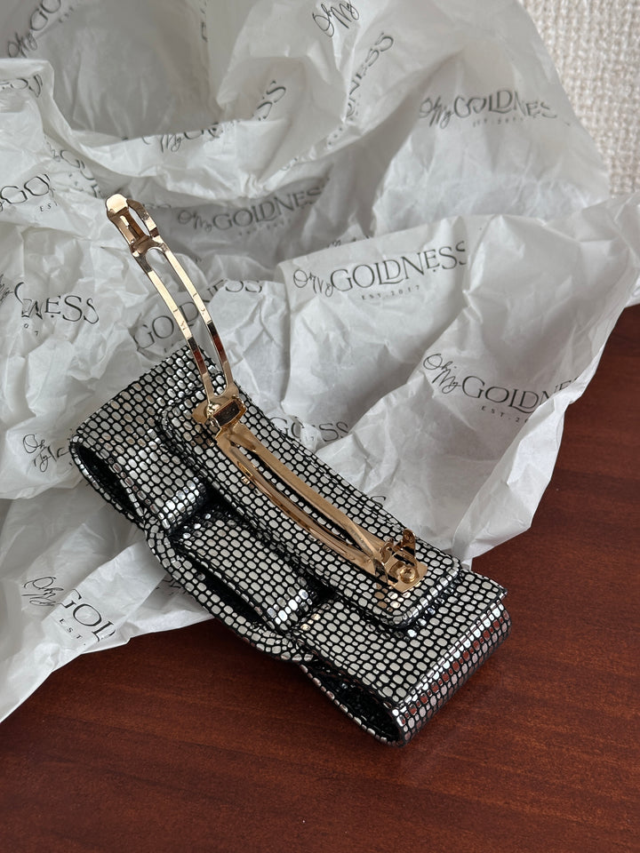 FERRAGAMO Leather Bow Hair Clip – Shimmer Finish & Timeless Elegance