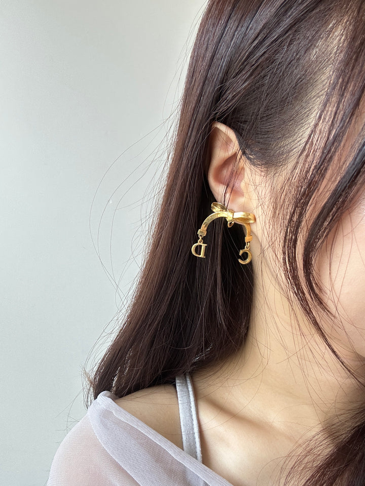 Dior CD Bow Drop Earrings ✨｜Sculptural Ribbon Bow × Swinging CD Charms × Vintage Gold-Tone Finish