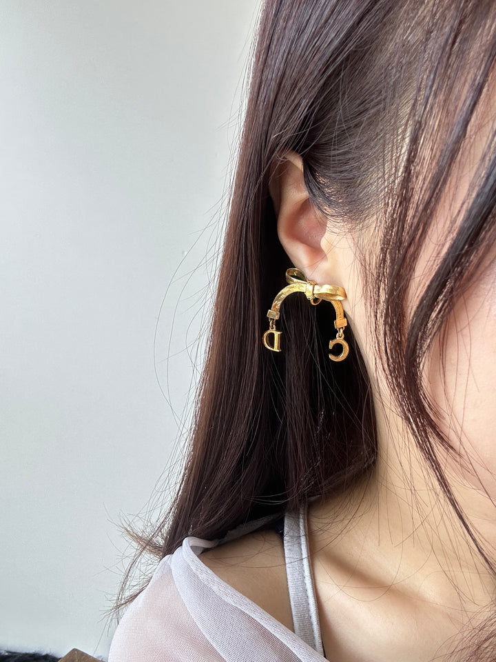 Dior CD Bow Drop Earrings ✨｜Sculptural Ribbon Bow × Swinging CD Charms × Vintage Gold-Tone Finish