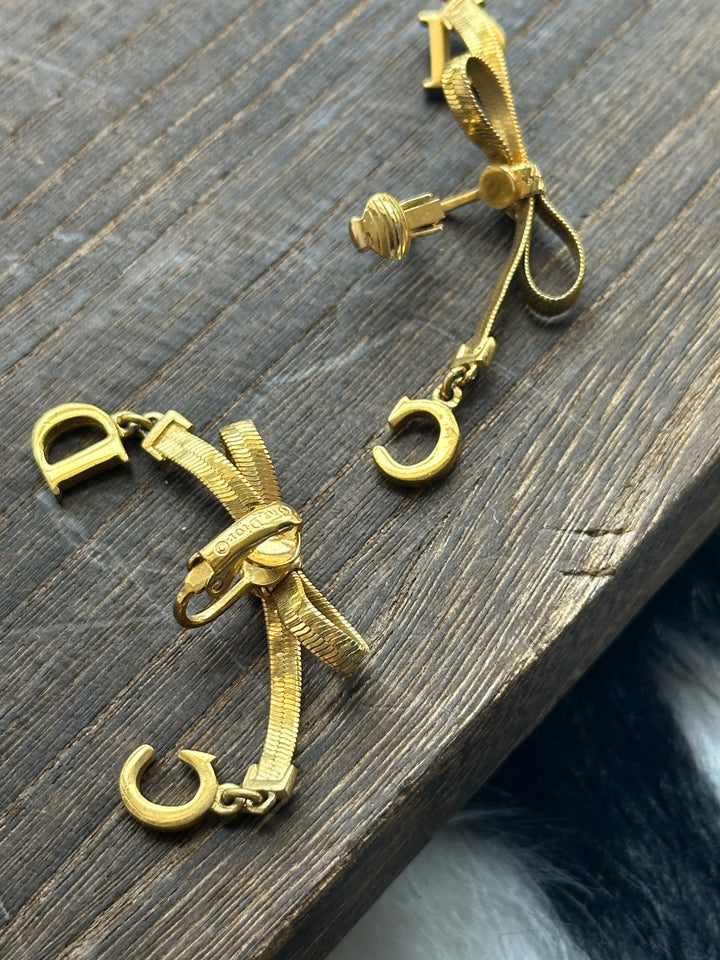 Dior CD Bow Drop Earrings ✨｜Sculptural Ribbon Bow × Swinging CD Charms × Vintage Gold-Tone Finish