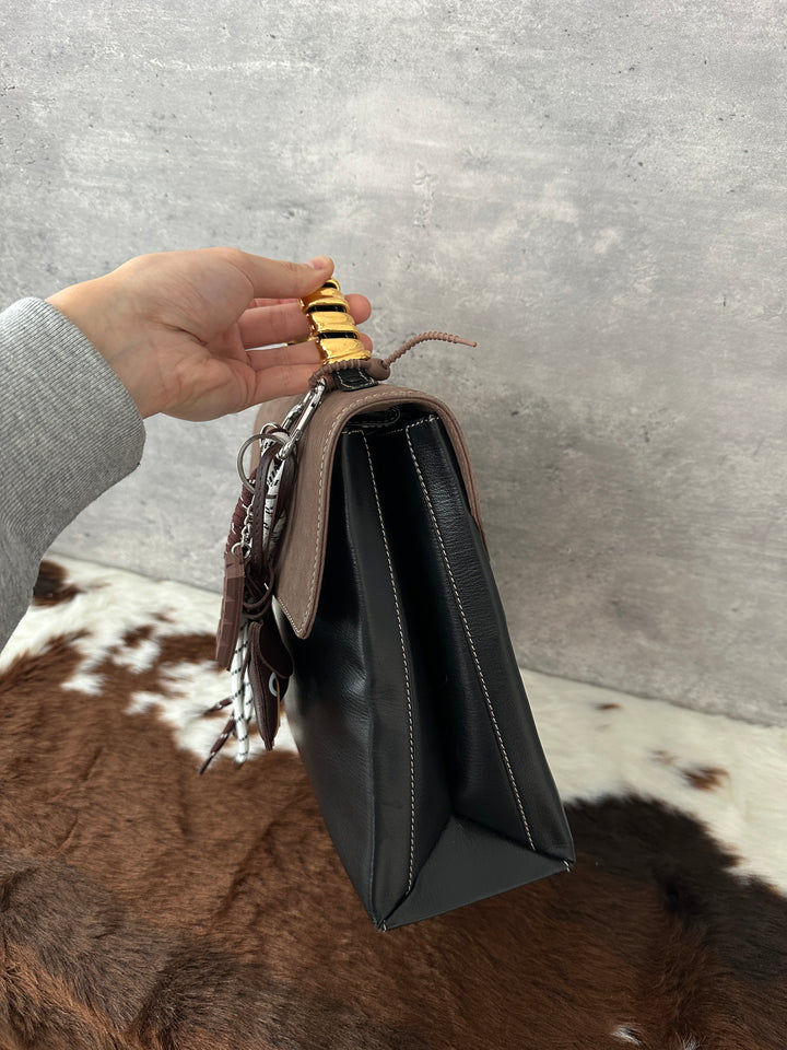 Loewe “Serpentine-Handle Kelly Top Handle” ✨🐍 | Rare, Elegant & Beautifully Structured