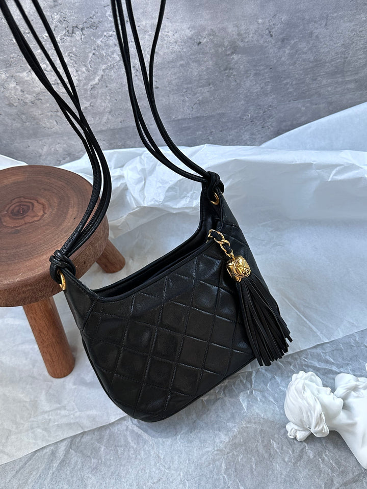 CHANEL Mini Hobo Crossbody – Black Quilted with Gold Ball Tassel 🖤✨