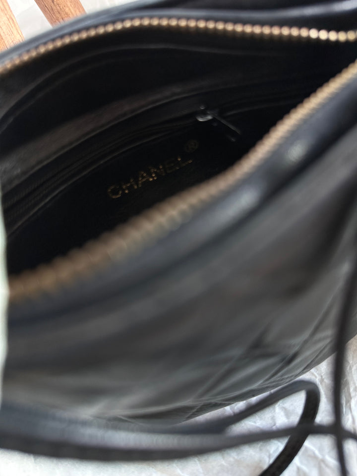 CHANEL Mini Hobo Crossbody – Black Quilted with Gold Ball Tassel 🖤✨