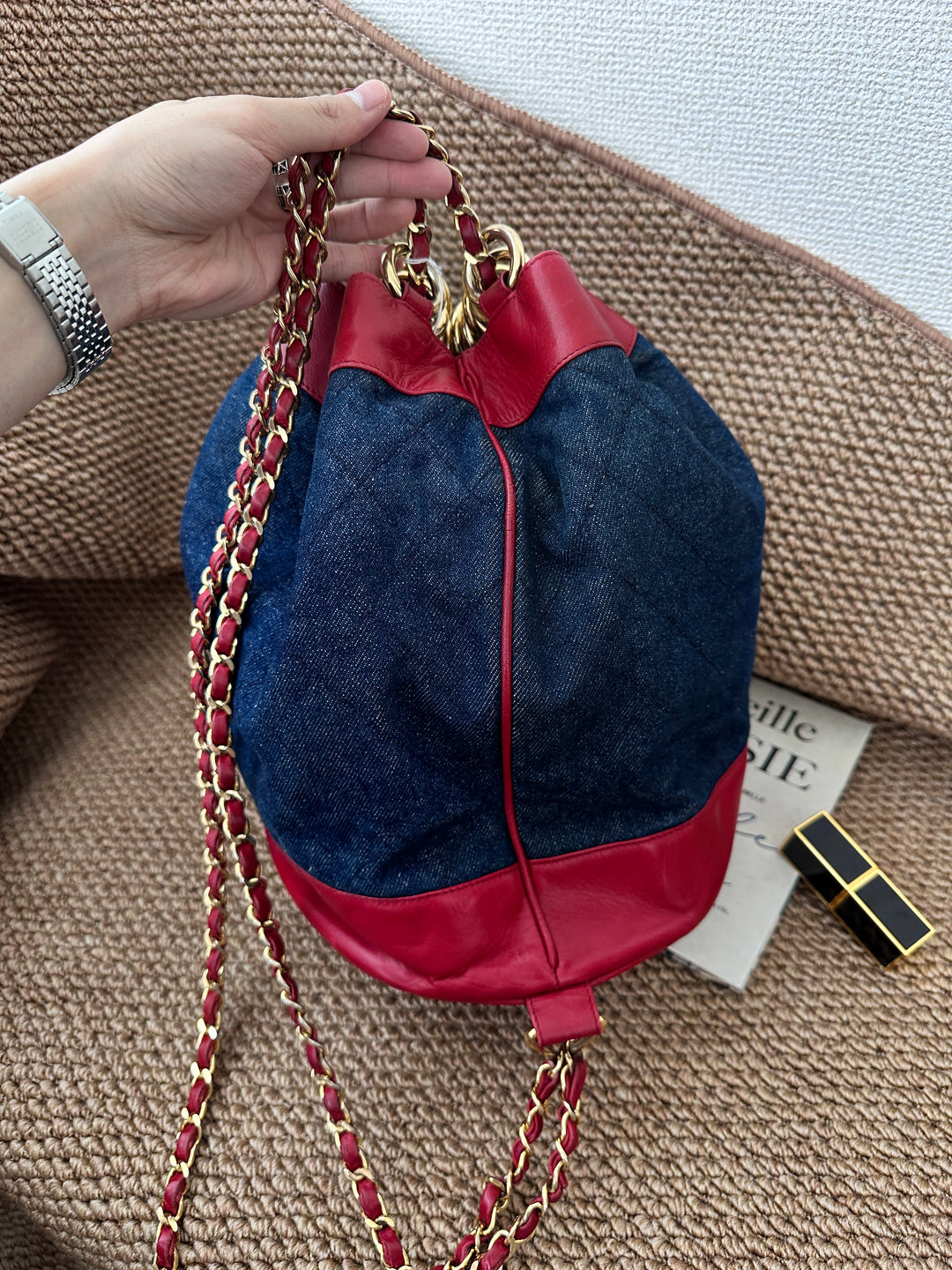 CHANEL Vintage Denim Bucket Backpack — Oversized CC Ring Logo with Red Leather Trim 🔥🖤 Casual Luxe Statement