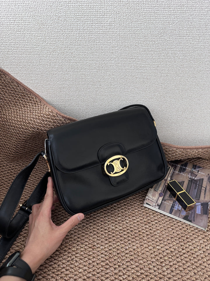 CELINE Triomphe Vintage Shoulder Bag — Black Leather & Oversized Gold Clasp 🖤✨ Collector’s Parisian Icon