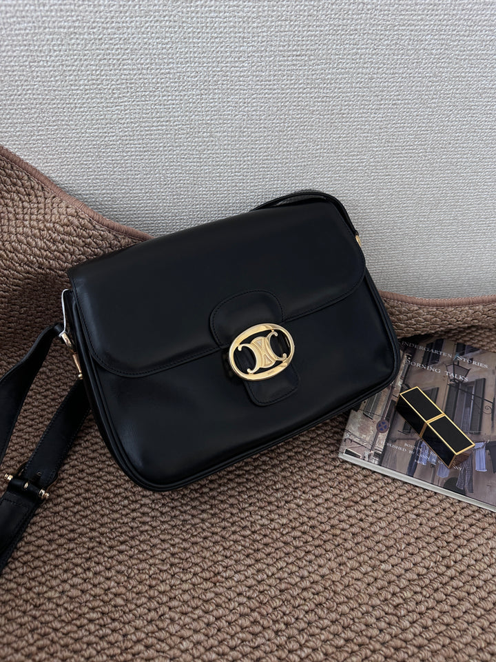 CELINE Triomphe Vintage Shoulder Bag — Black Leather & Oversized Gold Clasp 🖤✨ Collector’s Parisian Icon
