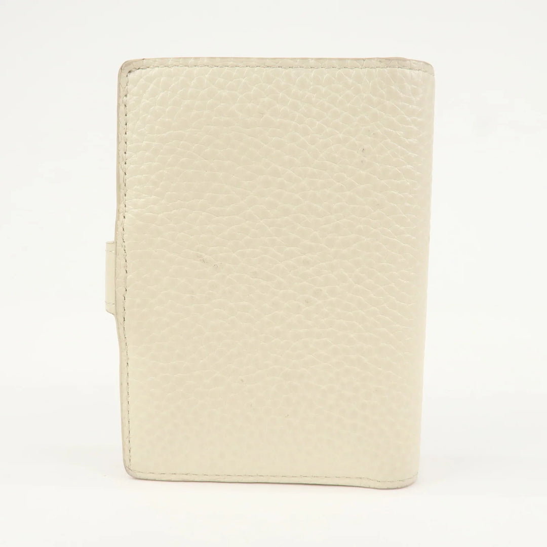 Louis Vuitton Capcines Taurillon Leather Vertical Wallet M11169