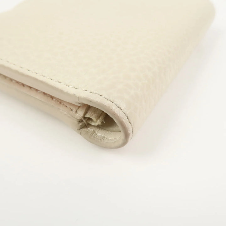 Louis Vuitton Capcines Taurillon Leather Vertical Wallet M11169